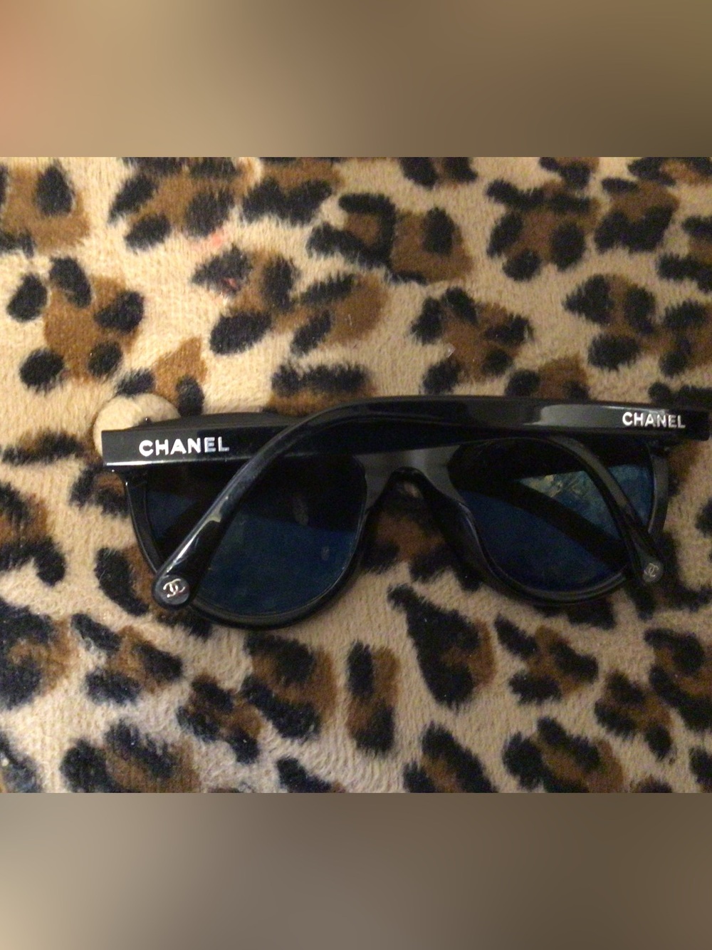 CHANEL Black Sunglasses with White Logo Accents